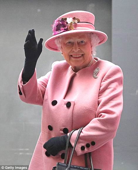 04F5975B000007D0-5587555-Pictured_Queen_Elizabeth_waving_to_crowds_in_Plymouth_on_March_2-a-14_1523061257277
