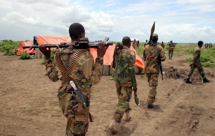 Jubbaland forces carry their ammunitions during a security patrol against Islamist al Shabaab militants in Bulagaduud town, north of Kismayu